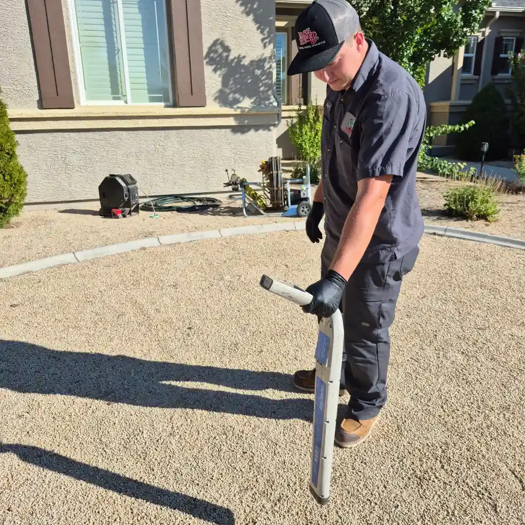 Tech locating sewer line for repair 3